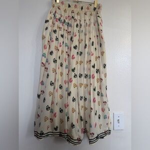 Elegant Cream Pleated mid kirt with Multicolor Print